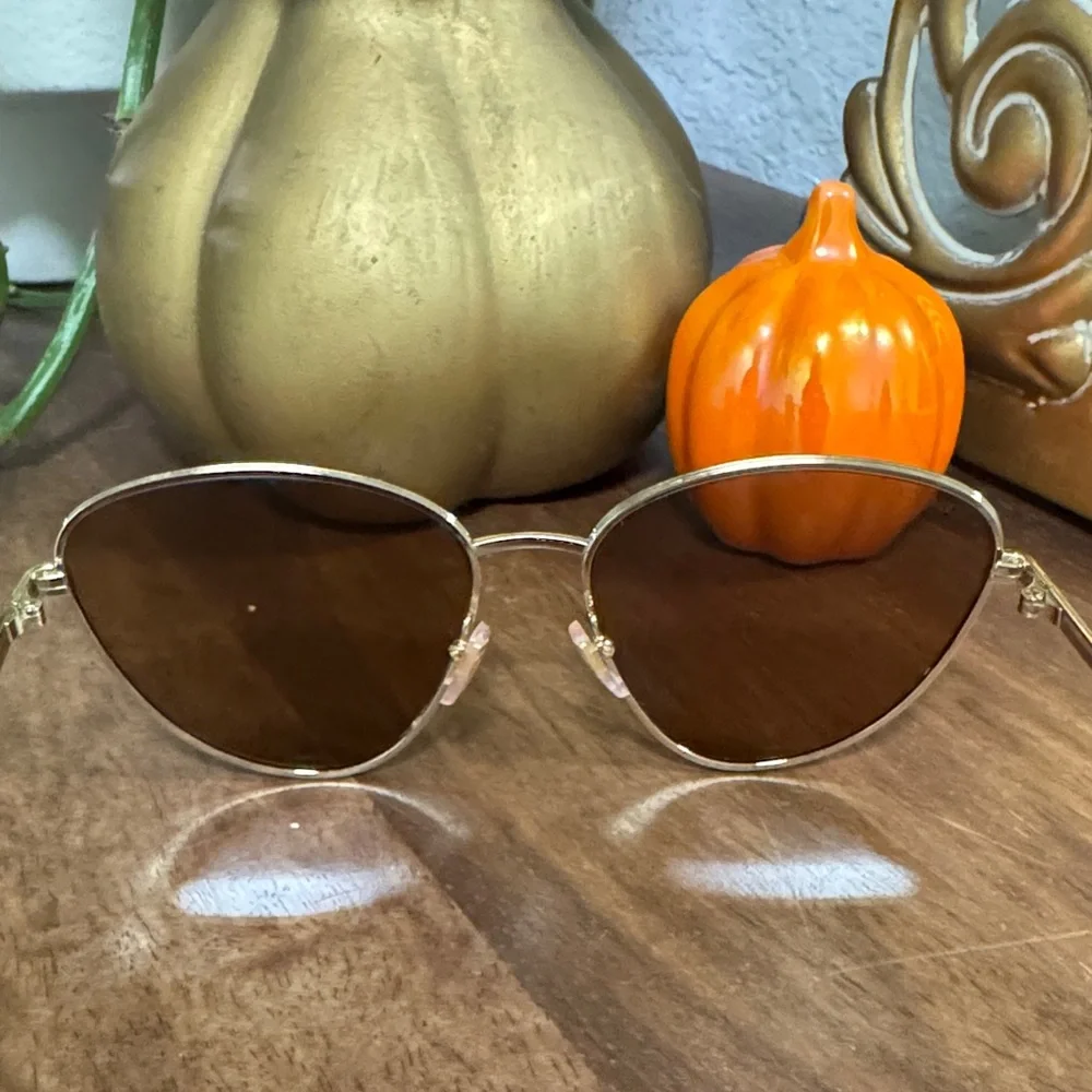 Gucci Gold Cat-Eye Sunglasses